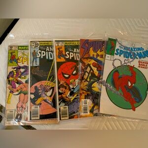 Take all 5 comic books Spider-Man